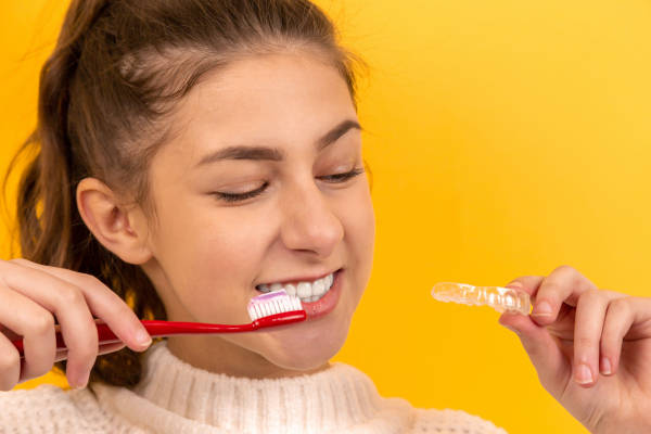 girl with toothbrush